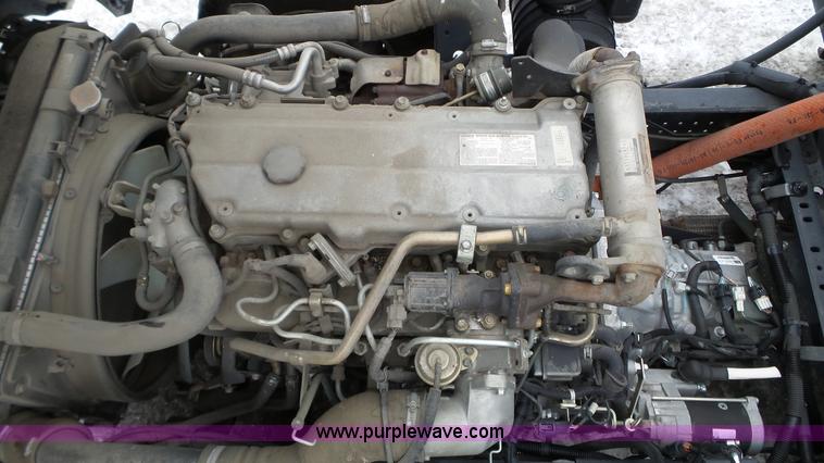 image for item L3923 2006 GMC W3500 sweeper truck