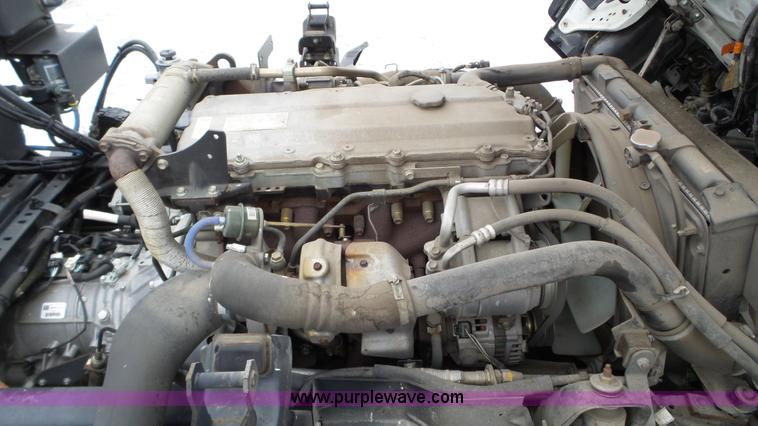 image for item L3923 2006 GMC W3500 sweeper truck