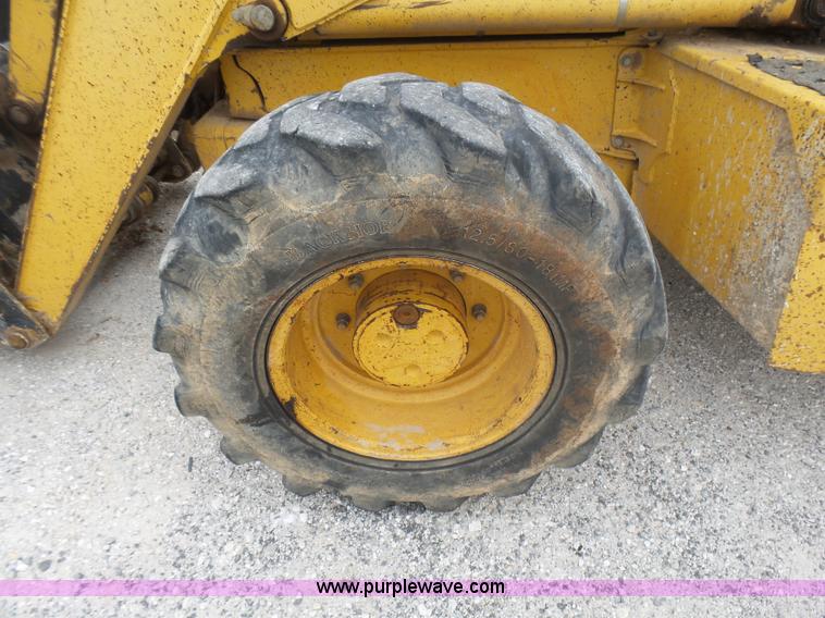 image for item L5434 2003 John Deere 310G backhoe