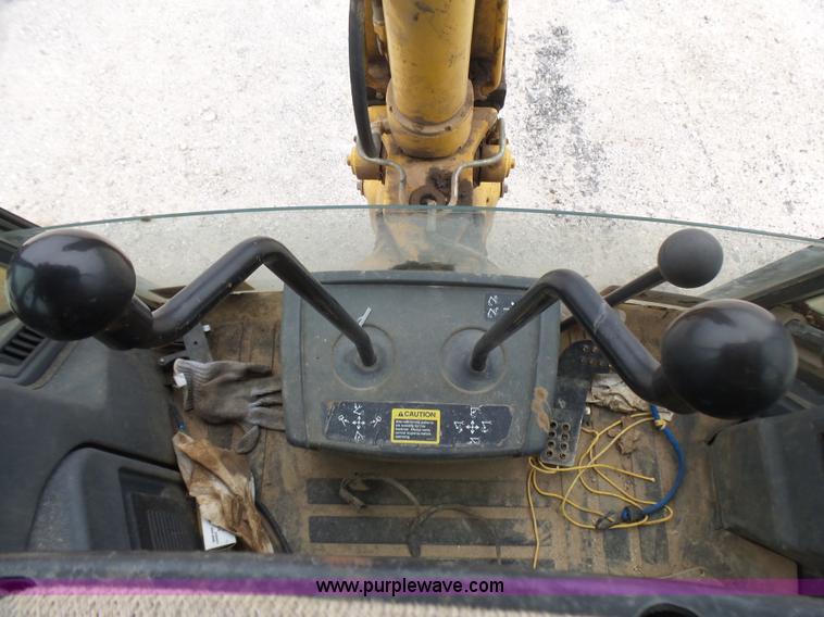 image for item L5434 2003 John Deere 310G backhoe