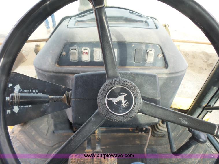 image for item L7266 2006 John Deere 644 backhoe