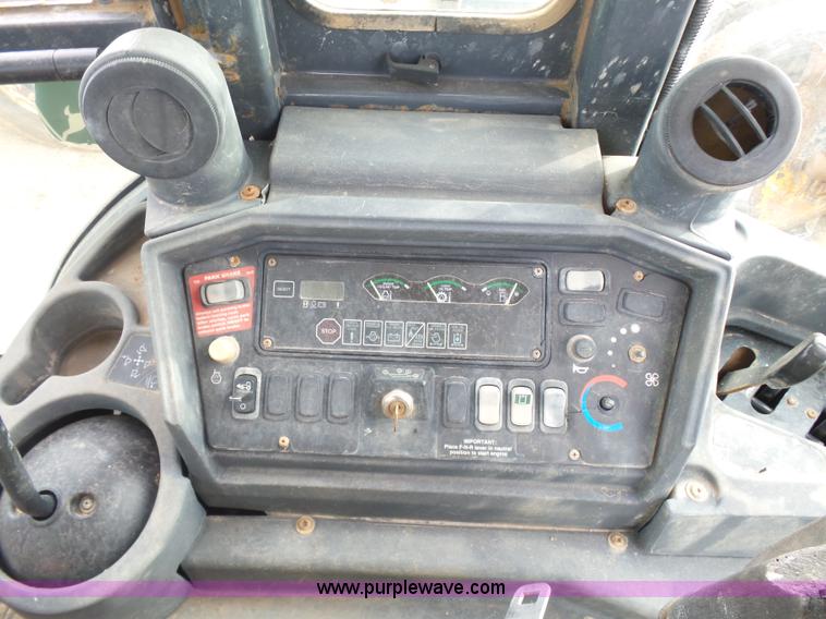 image for item L7266 2006 John Deere 644 backhoe