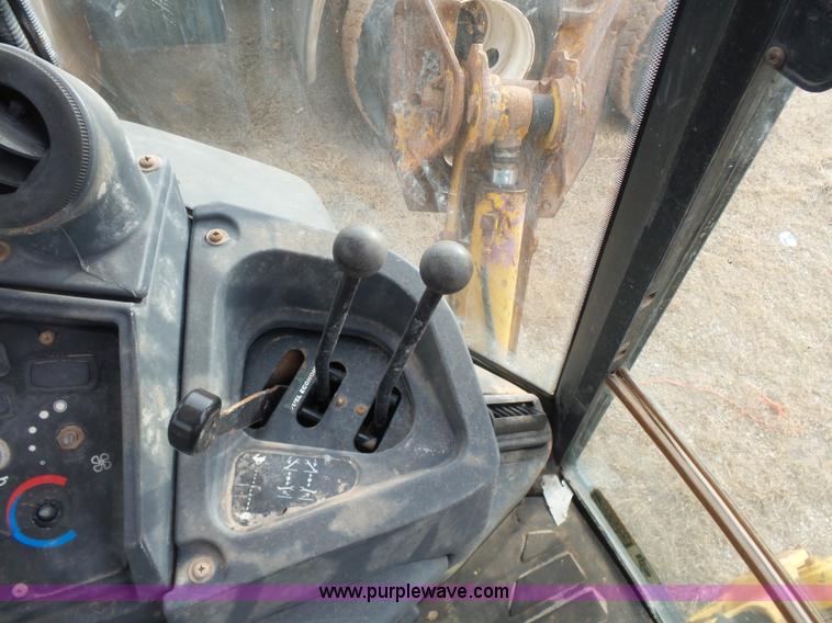 image for item L7266 2006 John Deere 644 backhoe