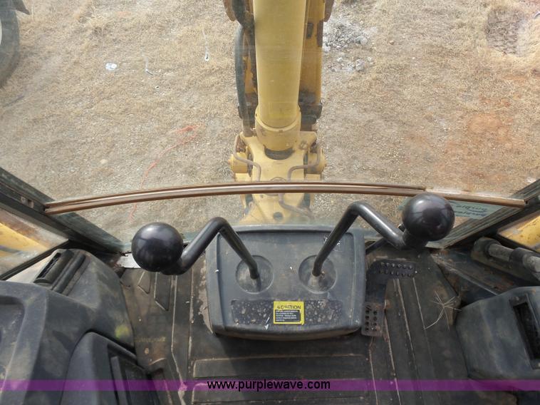 image for item L7266 2006 John Deere 644 backhoe