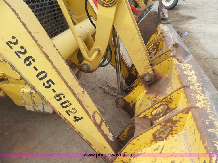 image for item L7266 2006 John Deere 644 backhoe