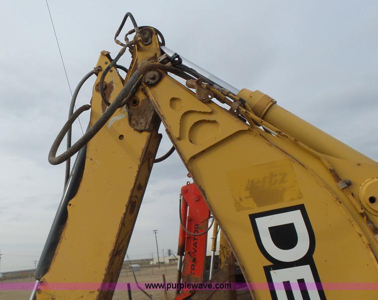 image for item L7266 2006 John Deere 644 backhoe