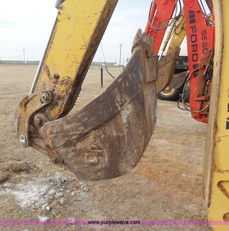 image for item L7266 2006 John Deere 644 backhoe