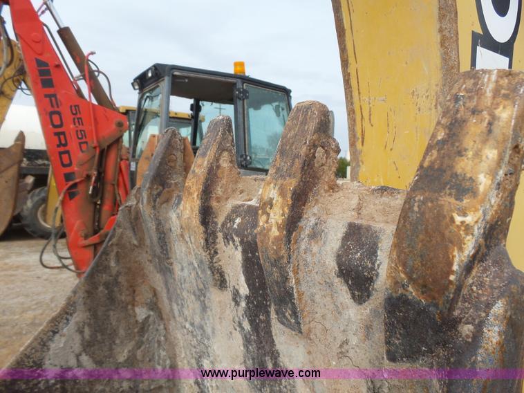 image for item L7266 2006 John Deere 644 backhoe