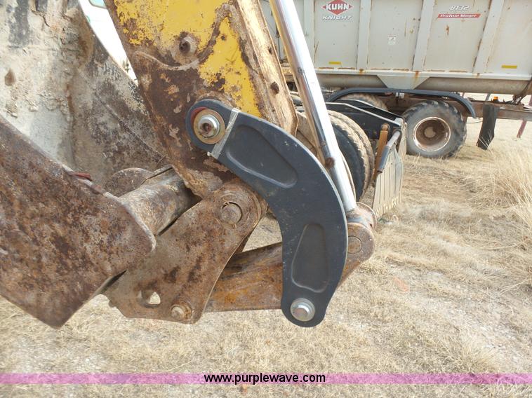 image for item L7266 2006 John Deere 644 backhoe