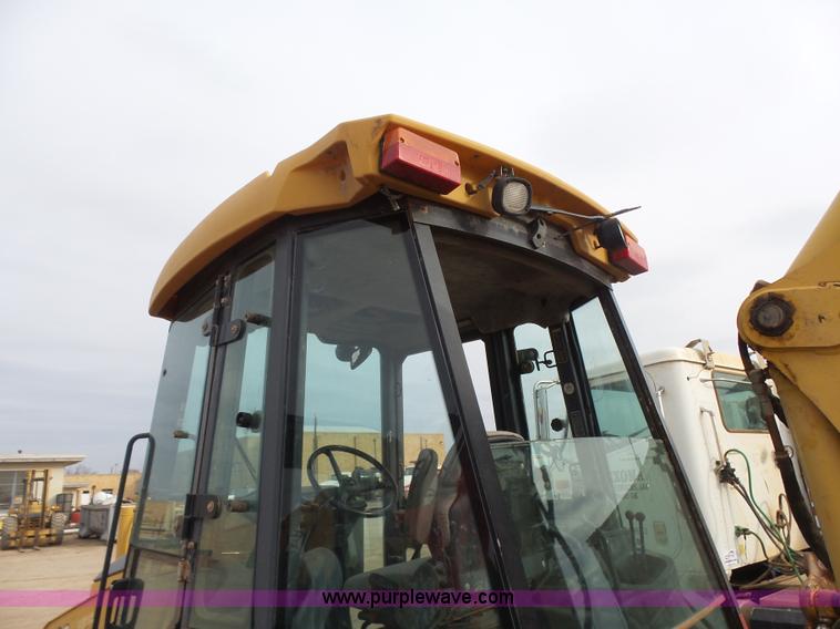 image for item L7266 2006 John Deere 644 backhoe