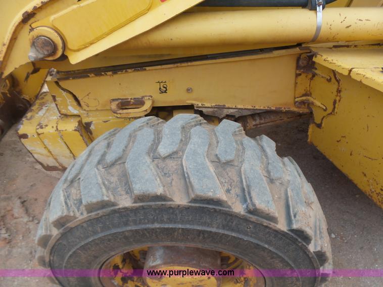 image for item L7266 2006 John Deere 644 backhoe