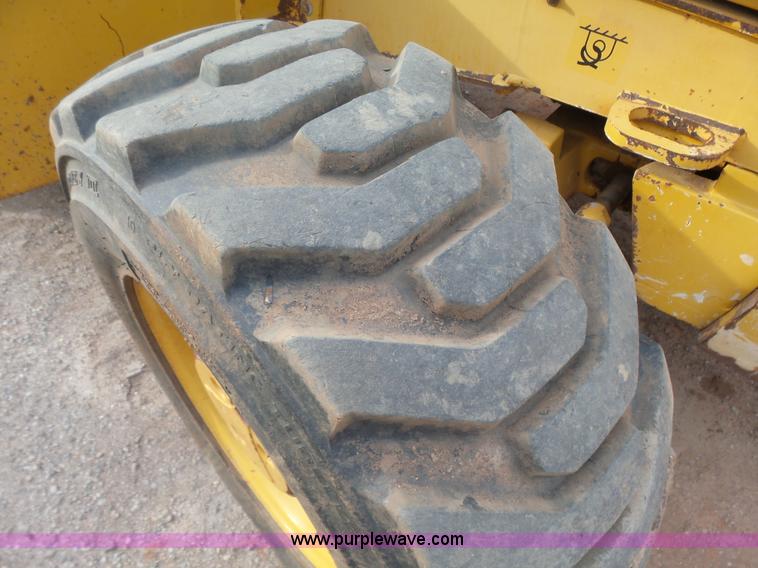 image for item L7266 2006 John Deere 644 backhoe