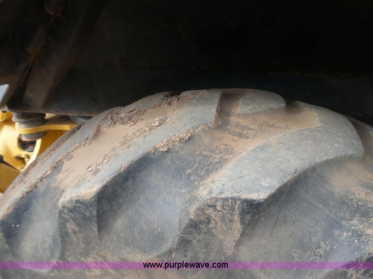 image for item L7266 2006 John Deere 644 backhoe