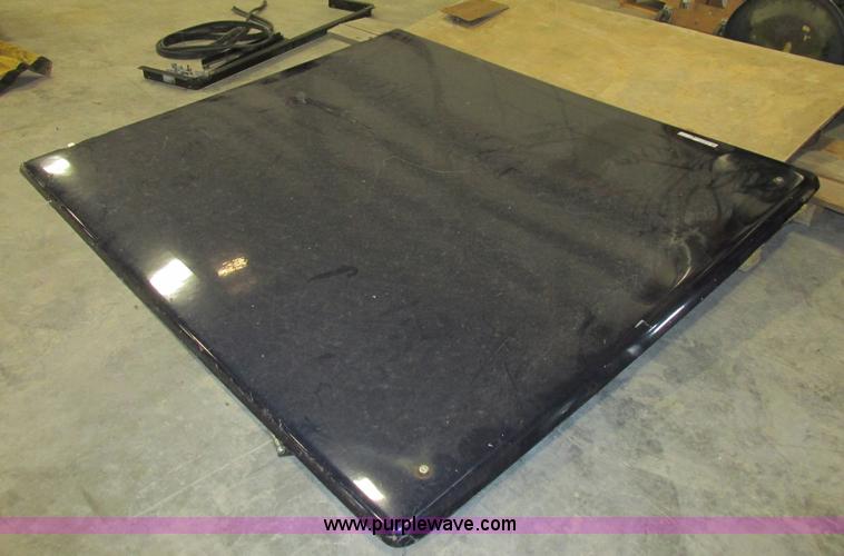 Snug top fiberglass bed cover in Columbia, MO Item AW9576 sold