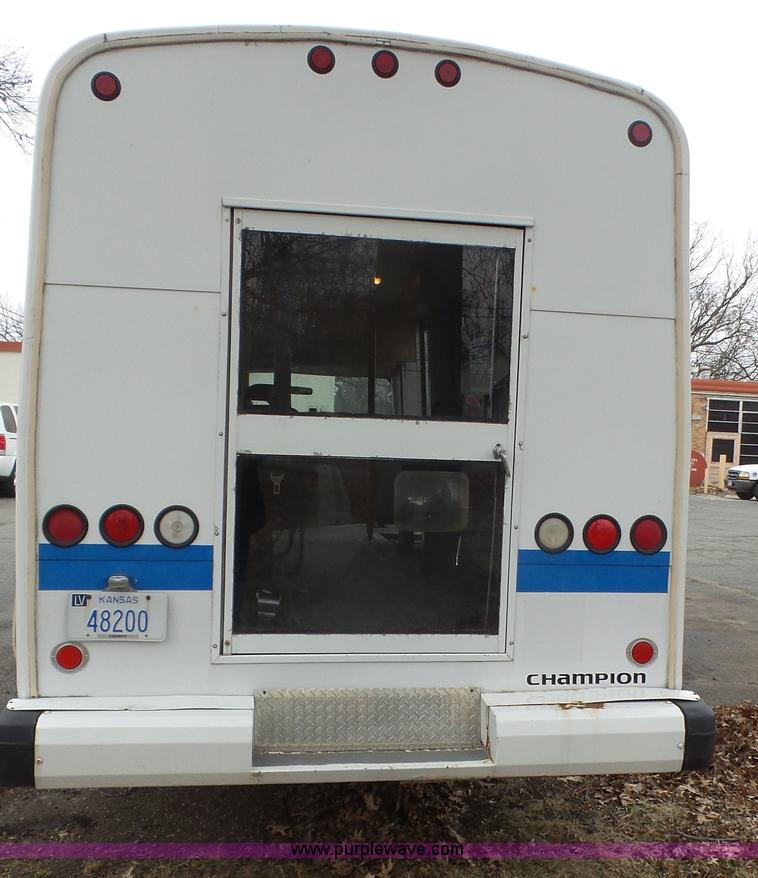 image for item J4702 2000 Ford 800 Champion bus