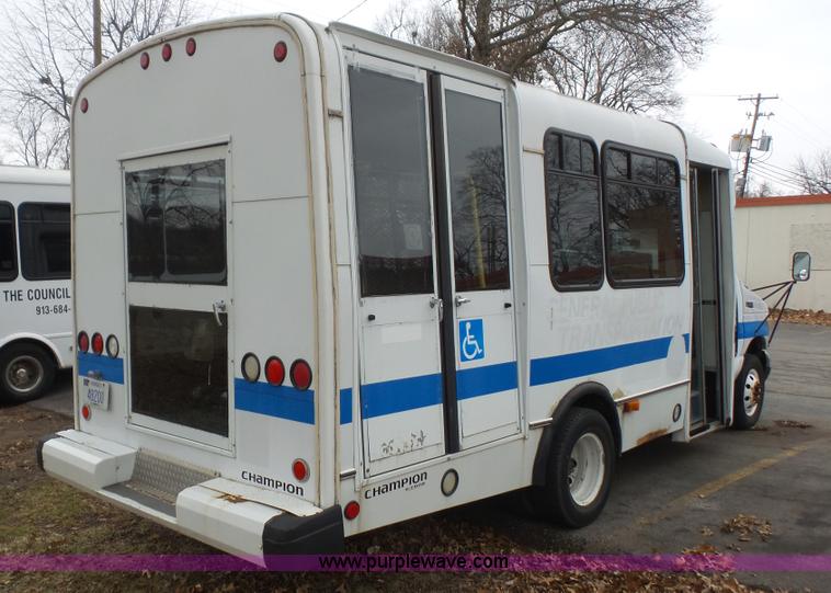 image for item J4702 2000 Ford 800 Champion bus