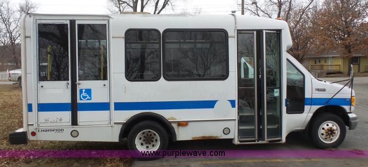 image for item J4702 2000 Ford 800 Champion bus