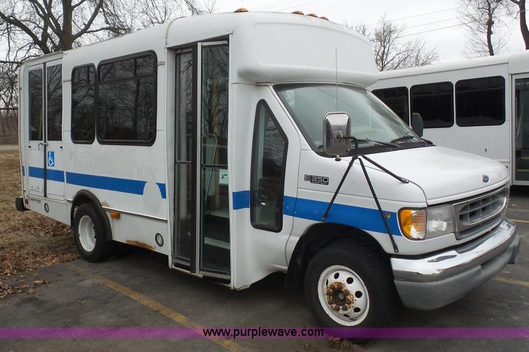 image for item J4702 2000 Ford 800 Champion bus