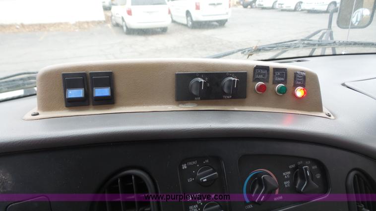 image for item J4702 2000 Ford 800 Champion bus