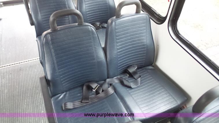 image for item J4702 2000 Ford 800 Champion bus