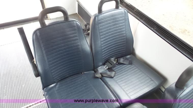 image for item J4702 2000 Ford 800 Champion bus