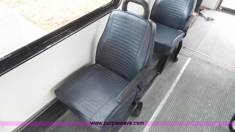 image for item J4702 2000 Ford 800 Champion bus