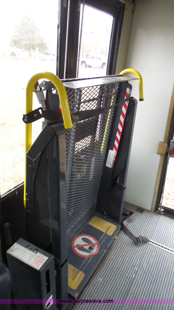 image for item J4702 2000 Ford 800 Champion bus