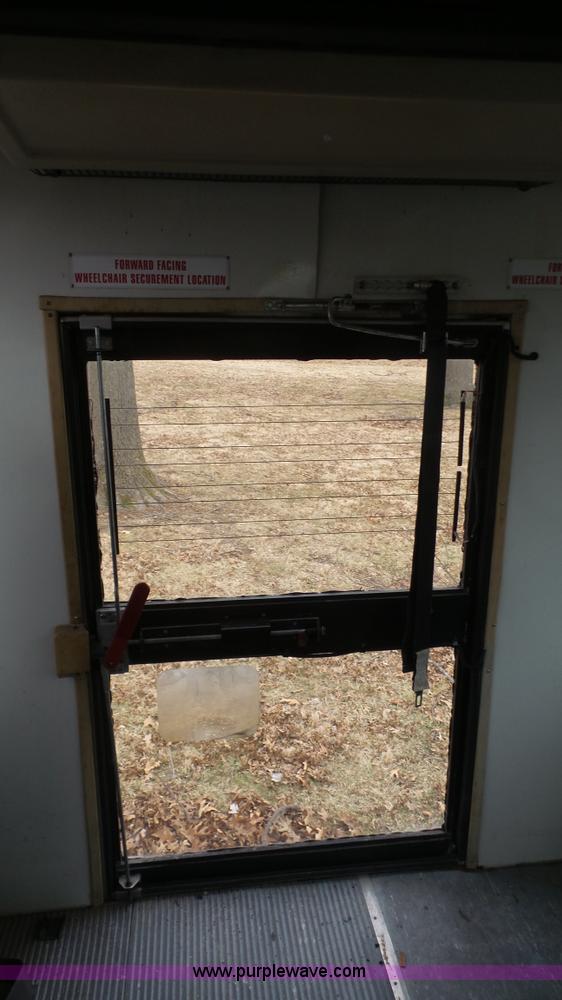 image for item J4702 2000 Ford 800 Champion bus