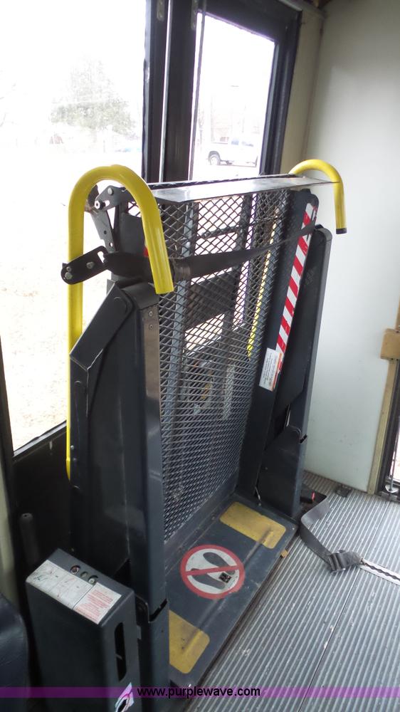 image for item J4702 2000 Ford 800 Champion bus