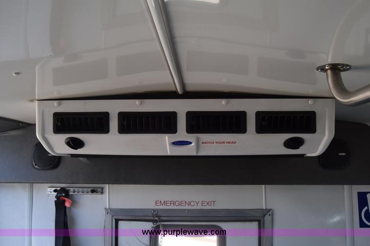 image for item K4341 2010 Ford E450 Super Duty shuttle bus