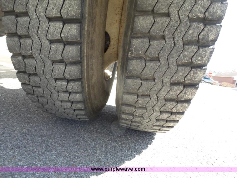 image for item L3689 2001 Freightliner FL70 water truck