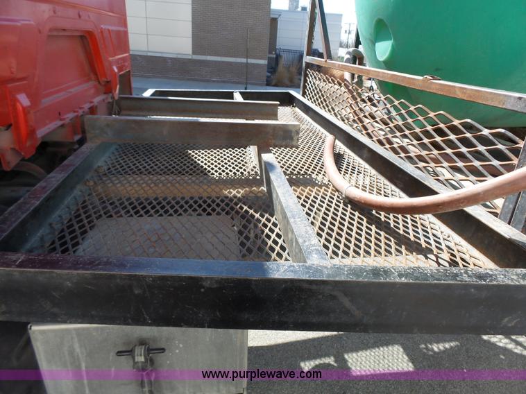 image for item L3689 2001 Freightliner FL70 water truck