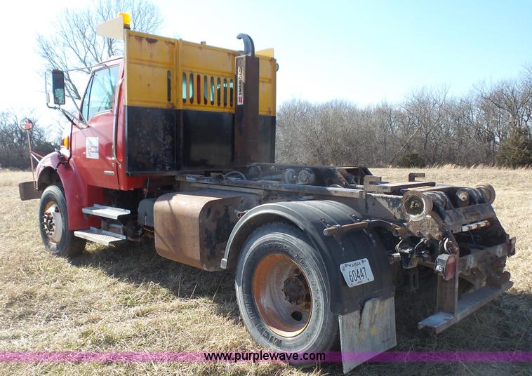 image for item L3693 2004 Sterling Acterra roll off container truck