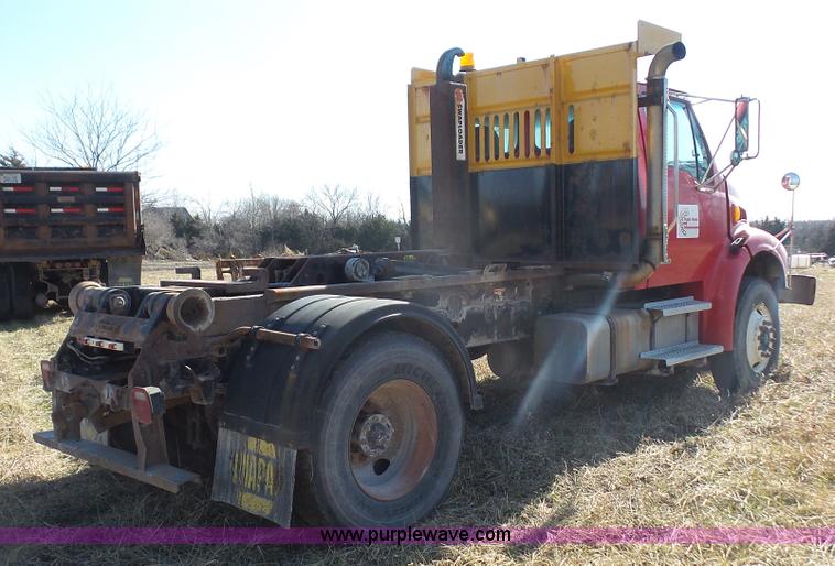 image for item L3693 2004 Sterling Acterra roll off container truck