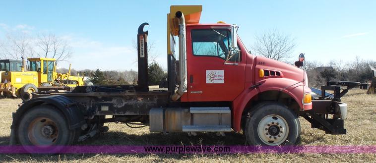image for item L3693 2004 Sterling Acterra roll off container truck