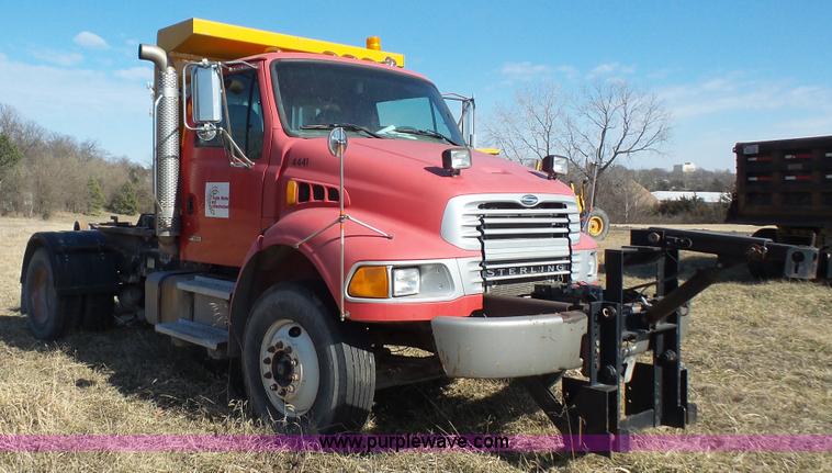 image for item L3693 2004 Sterling Acterra roll off container truck