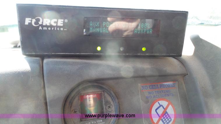 image for item L3693 2004 Sterling Acterra roll off container truck