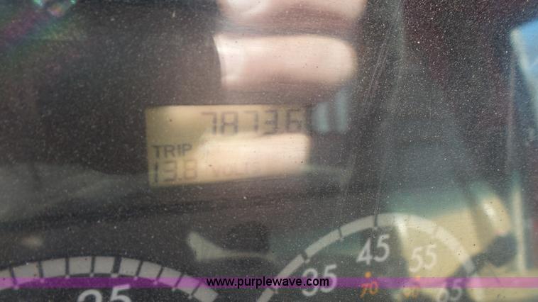 image for item L3693 2004 Sterling Acterra roll off container truck