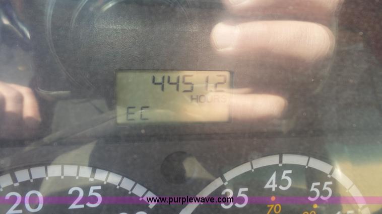 image for item L3693 2004 Sterling Acterra roll off container truck