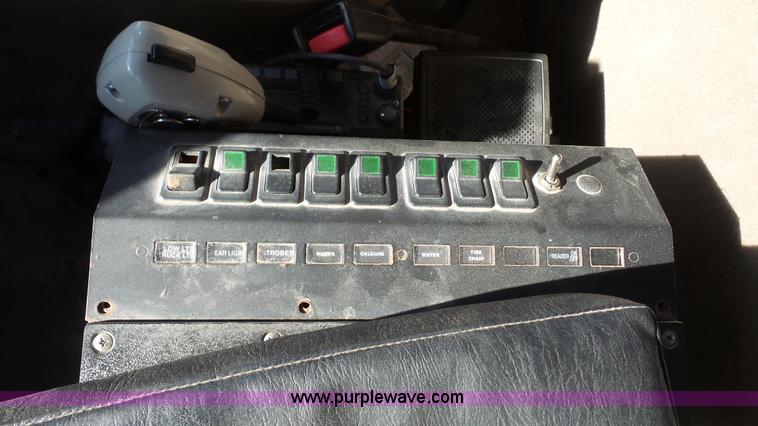 image for item L3693 2004 Sterling Acterra roll off container truck