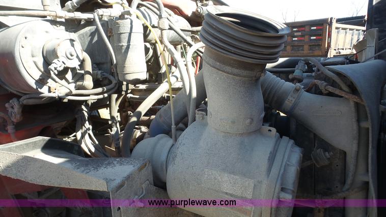 image for item L3693 2004 Sterling Acterra roll off container truck