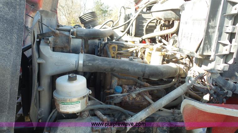 image for item L3693 2004 Sterling Acterra roll off container truck