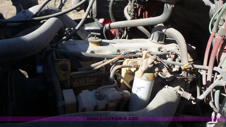 image for item L3693 2004 Sterling Acterra roll off container truck