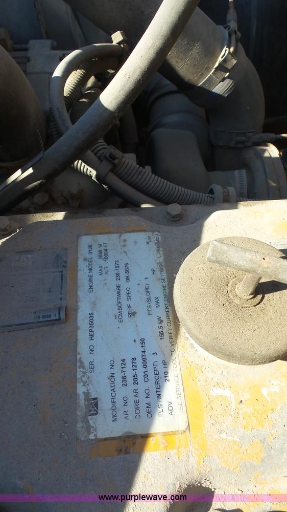 image for item L3693 2004 Sterling Acterra roll off container truck