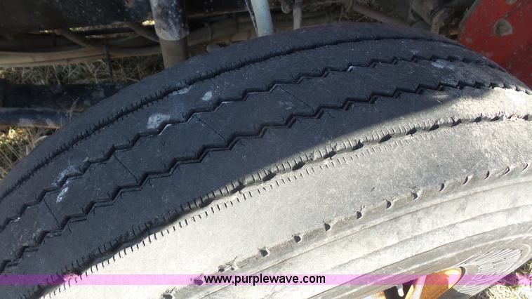 image for item L3693 2004 Sterling Acterra roll off container truck