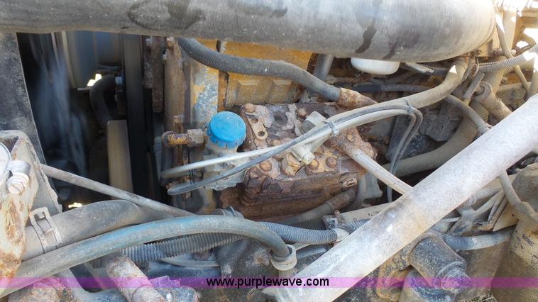 image for item L3693 2004 Sterling Acterra roll off container truck