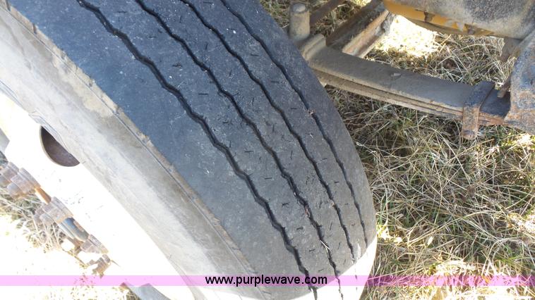 image for item L3693 2004 Sterling Acterra roll off container truck