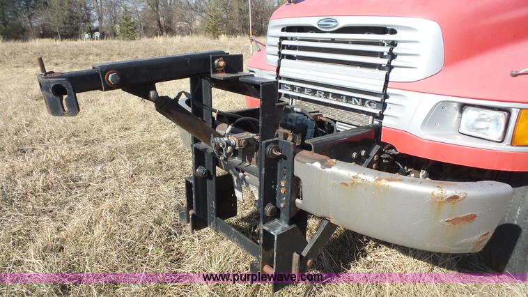 image for item L3693 2004 Sterling Acterra roll off container truck