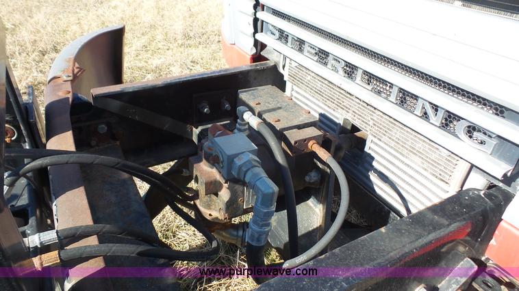 image for item L3693 2004 Sterling Acterra roll off container truck