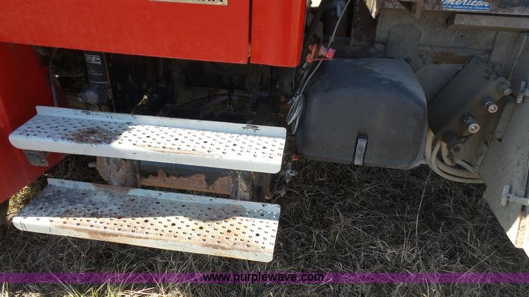 image for item L3693 2004 Sterling Acterra roll off container truck